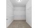 Walk-in closet with wire shelving and carpet flooring at 2075 Villa Spring Ct, Dacula, GA 30019