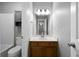 Bright bathroom with a tub and shower combo, a vanity with mirror, and modern light fixtures at 30 Village Dr, Cartersville, GA 30121