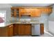 Traditional kitchen features granite countertops, stainless steel appliances, and wood cabinets at 30 Village Dr, Cartersville, GA 30121