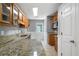 Kitchen with granite countertops, stainless steel appliances, and tile flooring at 30 Village Dr, Cartersville, GA 30121
