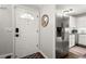 Inviting entryway next to the kitchen featuring stainless steel appliances at 3065 Camden Way, Alpharetta, GA 30005