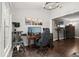 Well-lit office with a window, modern desk setup, and cozy reading nook at 3065 Camden Way, Alpharetta, GA 30005