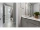This is a bathroom with vanity, white sink, and bathtub with shower at 408 Cottonwood Cir, Peachtree City, GA 30269