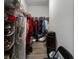 Walk-in closet featuring shelving, racks, and visible storage at 408 Cottonwood Cir, Peachtree City, GA 30269