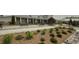 Beautifully landscaped community building with well-maintained grounds, inviting benches, and lush plantings at 408 Cottonwood Cir, Peachtree City, GA 30269