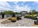 Scenic community grounds featuring manicured landscaping, a tranquil fountain, and inviting seating areas, perfect for relaxation and social gatherings at 408 Cottonwood Cir, Peachtree City, GA 30269