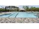 Large community pool with ample seating and lounge chairs at 408 Cottonwood Cir, Peachtree City, GA 30269
