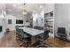 Modern conference room with a large table, comfortable chairs, and built-in bookshelves at 408 Cottonwood Cir, Peachtree City, GA 30269