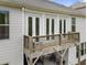 Spacious deck area with seating, ideal for relaxing and enjoying outdoor views at 408 Cottonwood Cir, Peachtree City, GA 30269