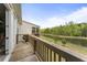 Spacious deck overlooking a tranquil lake, perfect for outdoor relaxation and entertaining at 408 Cottonwood Cir, Peachtree City, GA 30269