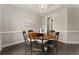 Elegant dining room with hardwood floors, a chandelier, and light grey walls at 408 Cottonwood Cir, Peachtree City, GA 30269
