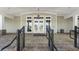 Elegant clubhouse entrance with a covered porch area at 408 Cottonwood Cir, Peachtree City, GA 30269