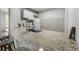 Modern kitchen with stainless steel sink, granite countertops, and subway tile backsplash at 408 Cottonwood Cir, Peachtree City, GA 30269
