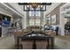 Spacious lounge area with ample seating, a bar, and high ceilings at 408 Cottonwood Cir, Peachtree City, GA 30269