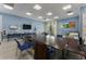 Bright meeting room with a long table, chairs, and natural light at 408 Cottonwood Cir, Peachtree City, GA 30269