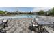 Spectacular community pool offering lap lanes, shallow areas, and inviting lounge spaces, all set amidst lush landscaping at 408 Cottonwood Cir, Peachtree City, GA 30269