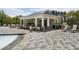 Relaxing pool pavilion featuring comfortable seating, shade, and a serene ambiance, ideal for enjoying leisurely afternoons at 408 Cottonwood Cir, Peachtree City, GA 30269