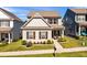 Charming two-story home featuring manicured lawn and lovely front porch at 637 Sunflower Dr, Canton, GA 30114