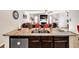 Kitchen island with granite countertops and stainless steel appliances at 637 Sunflower Dr, Canton, GA 30114