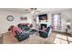 Comfortable living room with a fireplace, plush seating, and great lighting at 637 Sunflower Dr, Canton, GA 30114