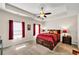 The primary bedroom features a tray ceiling and carpeted floors at 637 Sunflower Dr, Canton, GA 30114