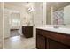 Bathroom with a sink and a view into the bedroom at 640 Parkside Place Dr, Mcdonough, GA 30253
