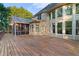 Beautiful backyard with a spacious deck and screened-in porch for outdoor entertaining at 519 River Estates Pkwy, Canton, GA 30115
