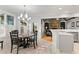 Breakfast nook featuring large windows and access to the open-concept kitchen at 519 River Estates Pkwy, Canton, GA 30115