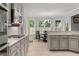 Gourmet kitchen with stainless steel appliances and views of a breakfast nook at 519 River Estates Pkwy, Canton, GA 30115