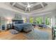 Spacious main bedroom boasts trey ceiling, bay window, and hardwood floors at 519 River Estates Pkwy, Canton, GA 30115