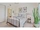 Cozy bedroom featuring hardwood floors and ample natural light at 1820 Peachtree Nw St # 1008, Atlanta, GA 30309