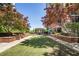 Well manicured courtyard features brick-lined seating areas with lush trees and an inviting gazebo at 1820 Peachtree Nw St # 1008, Atlanta, GA 30309