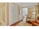 Hallway features beautiful wallpaper, dark wood floors, and a sliding glass door at 1820 Peachtree Nw St # 1008, Atlanta, GA 30309