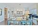 Bright living room showcasing modern furnishings, hardwood flooring, and piano at 1820 Peachtree Nw St # 1008, Atlanta, GA 30309