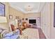 Relaxing living room area with comfortable seating and built-in storage at 1820 Peachtree Nw St # 1008, Atlanta, GA 30309
