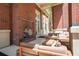 Comfortable outdoor lounge area featuring plush seating around a cozy fireplace at 1820 Peachtree Nw St # 1008, Atlanta, GA 30309