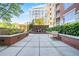 A relaxing patio area features comfortable seating, a fountain, and well-maintained landscaping at 1820 Peachtree Nw St # 1008, Atlanta, GA 30309