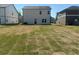 Spacious backyard with a combination of grass and natural areas at 2117 Boxwood Se Cir, Conyers, GA 30094