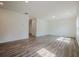 Bright and airy living room featuring wood-look floors and recessed lighting at 2117 Boxwood Se Cir, Conyers, GA 30094