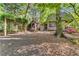 Backyard featuring an arbor, playhouse, and charming details, perfect for outdoor enjoyment and relaxation at 2287 Armand Ne Rd, Atlanta, GA 30324