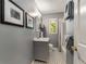 A bathroom featuring black and white patterned floors and subway tile in the shower at 2287 Armand Ne Rd, Atlanta, GA 30324
