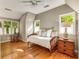 Bedroom featuring hardwood floors and natural light from multiple windows at 2287 Armand Ne Rd, Atlanta, GA 30324