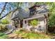 Well-maintained brick home with charming architectural details and manicured landscaping at 2287 Armand Ne Rd, Atlanta, GA 30324