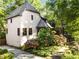 Beautifully designed home showcasing its architectural features and lush surroundings at 2287 Armand Ne Rd, Atlanta, GA 30324