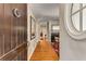 Elegant foyer with hardwood floors, a round window, and view of the living room at 2287 Armand Ne Rd, Atlanta, GA 30324