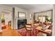 Bright and airy living room with a fireplace, hardwood floors, and comfortable seating at 2287 Armand Ne Rd, Atlanta, GA 30324