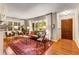 Cozy living room with hardwood floors, large windows, and stylish furnishings at 2287 Armand Ne Rd, Atlanta, GA 30324