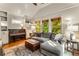 Cozy living room with natural light, built-in cabinets and a comfortable sofa at 2287 Armand Ne Rd, Atlanta, GA 30324