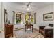 A well-lit office with multiple windows and hardwood floors at 2287 Armand Ne Rd, Atlanta, GA 30324