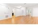 Finished basement featuring laminate flooring, white walls, and an open layout at 3902 Concord Walk Se Dr, Smyrna, GA 30082